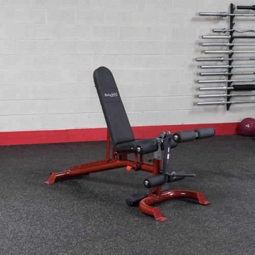 Установленная опция сгибание-разгибание ног (керл) Body-Solid GLDA3 на примере скамьи GFID100